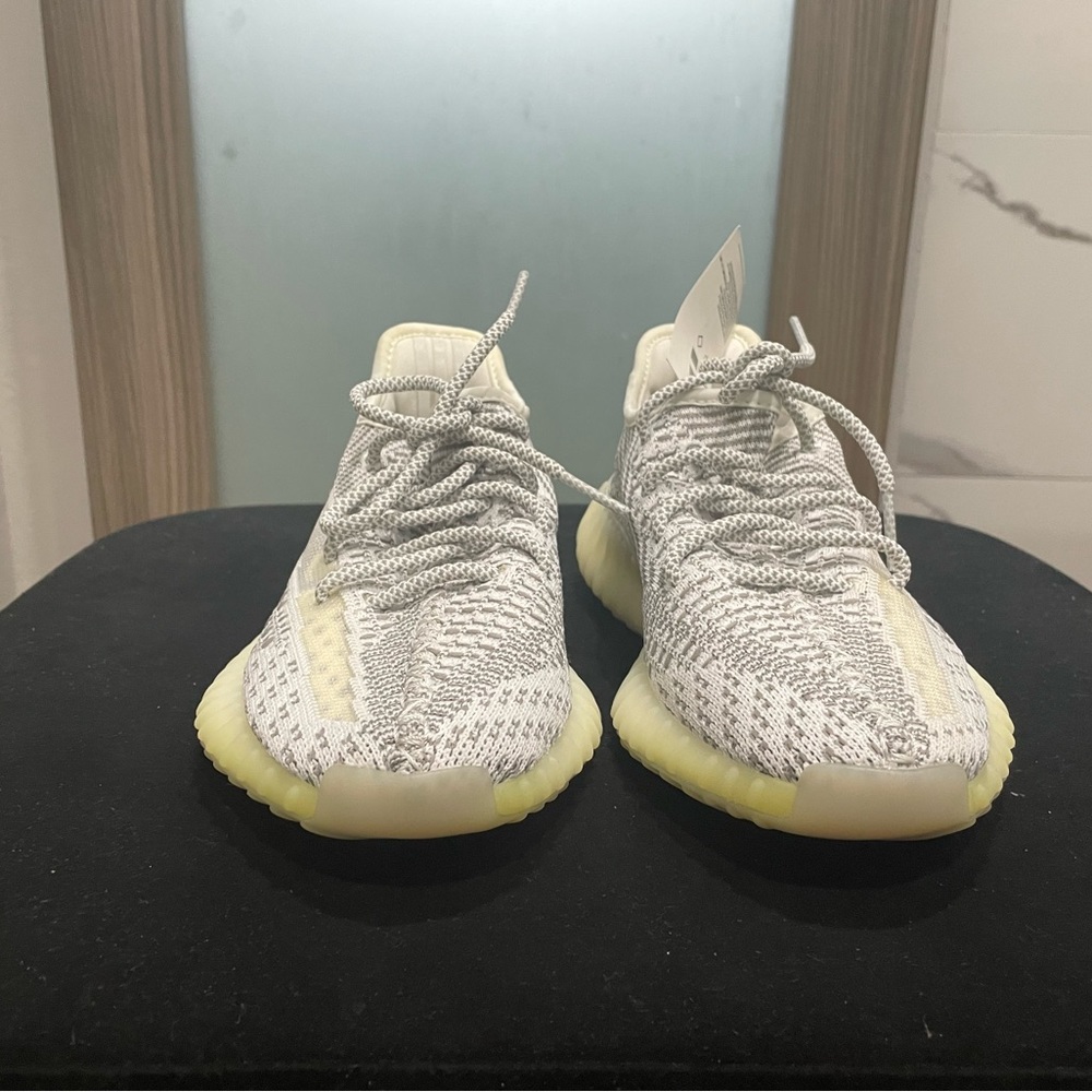 Never Used with tags Yeezy shoes. Grey and White Size 4.5 US